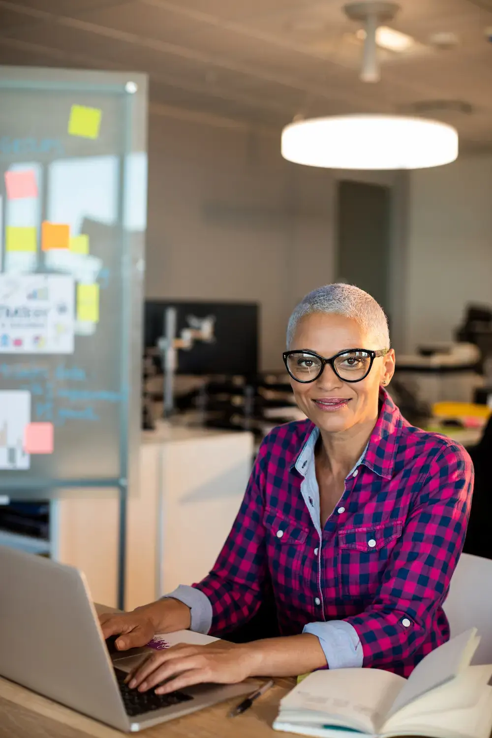 portrait-creative-businesswoman-working-desk-office